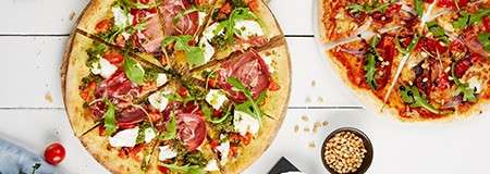 Pizza cut into slices 