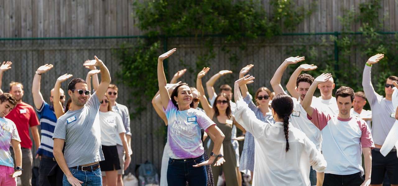 Delegates doing yoga.