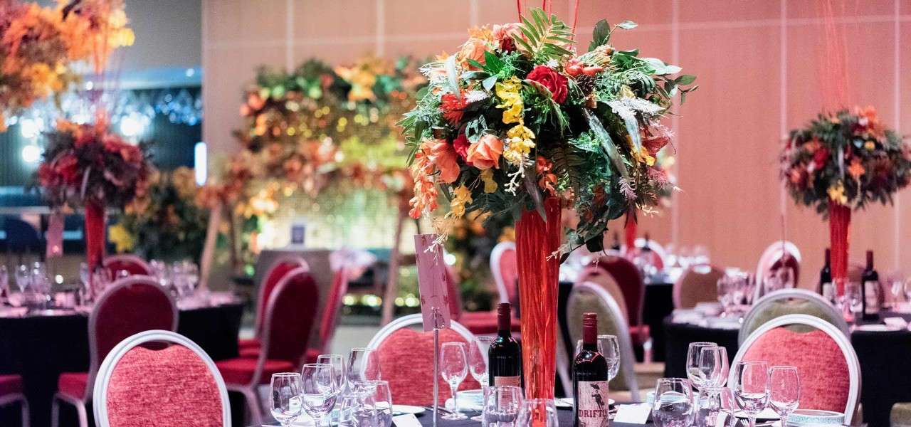 Autumnal gala dinner set up at the relaunch event, The Venue, Woburn Forest.