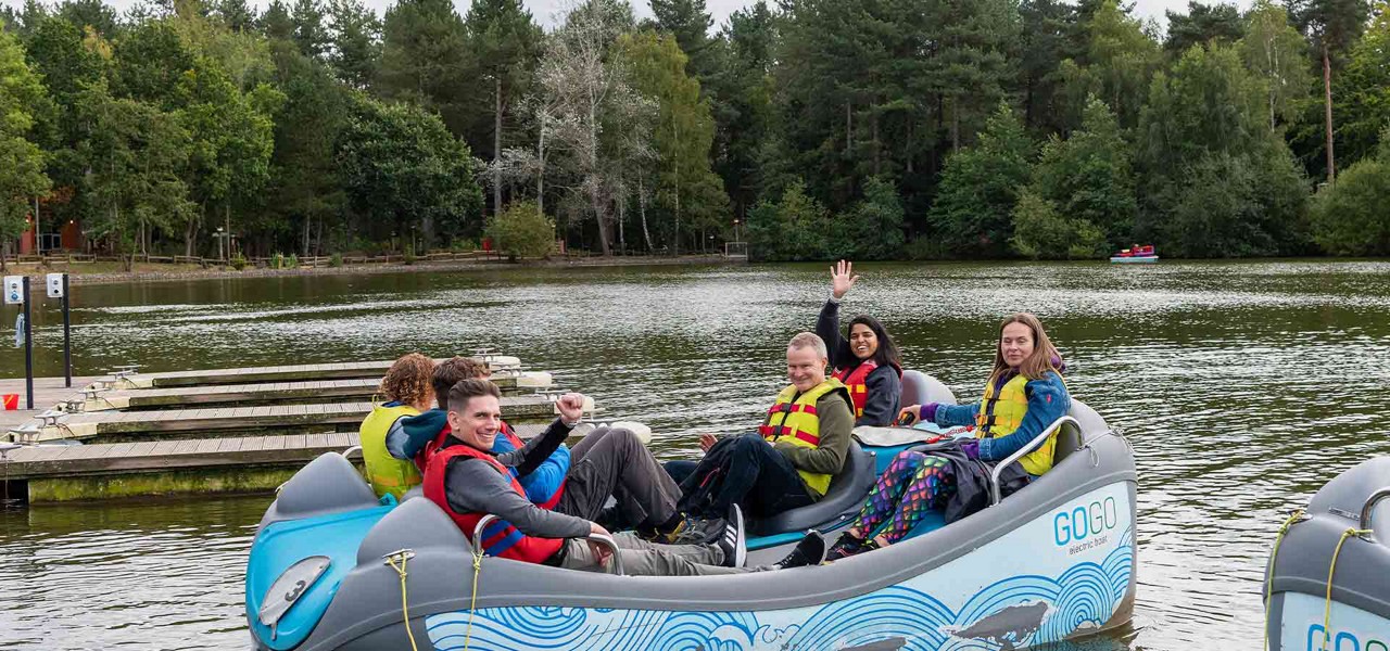 Delegates on a pedalo.